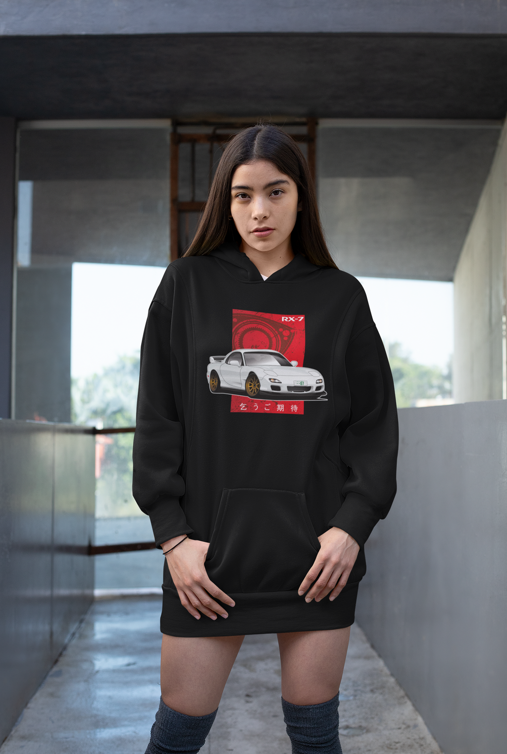 Woman wearing a black Mazda RX-7 hoodie featuring the rotary engine in automotive clothing - Modified Street Style