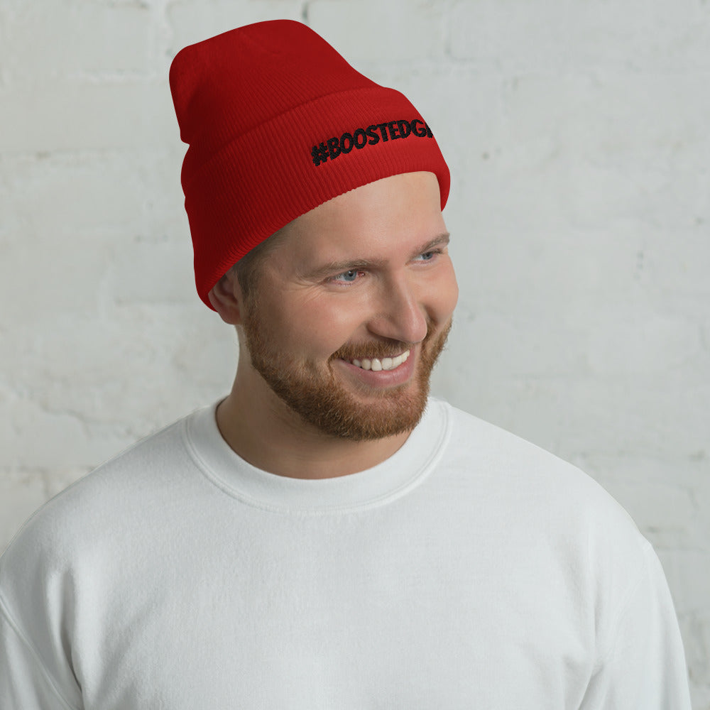 man wearing a Red #BoostedGang car Beanie under the car clothing section - Modified Street Style