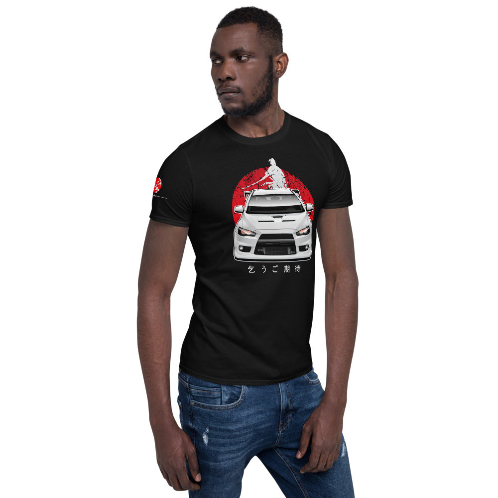 Angled view of a man wearing a black Mitsubishi Evo t shirt in car apparel - Modified Street Style