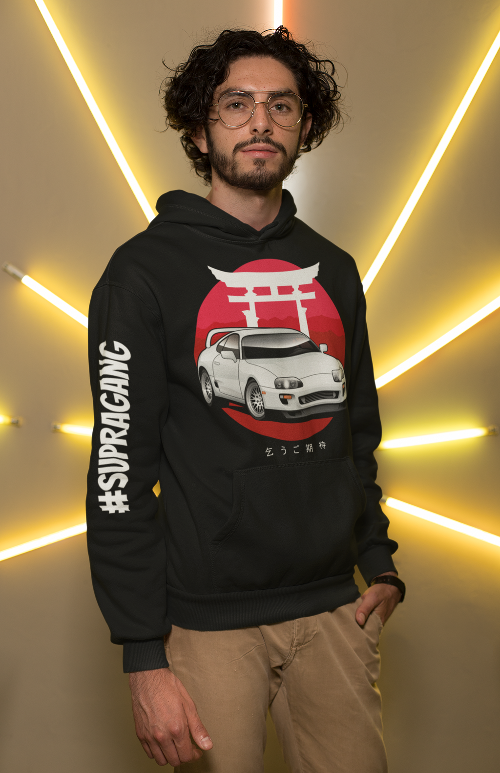 Man wearing a custom black MK4 Toyota Supra Hoodie in car apparel - Modified Street Style